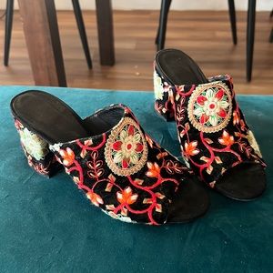 Made in Spain embroidered open toe mules.